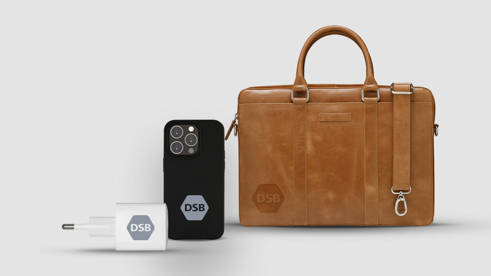 Customised brown Nordborg leather briefcase, recycled phone cases and re-charge charging products with DSB logo