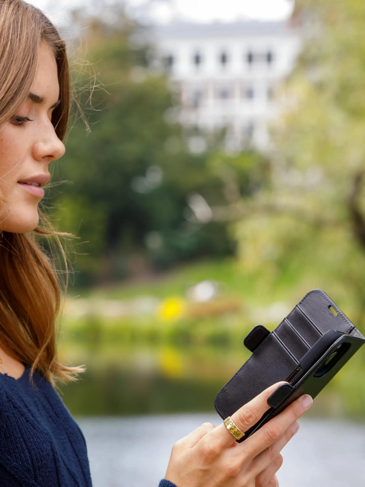 Stockholm - iPhone 17e/16e/15/14/13 - Black Phone Case